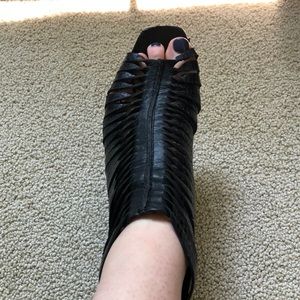 Strappy black heels